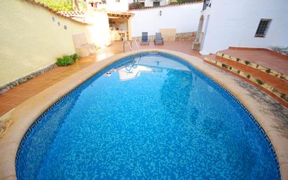 Swimming pool of House or chalet for sale in Dénia  with Air Conditioner, Terrace and Swimming Pool