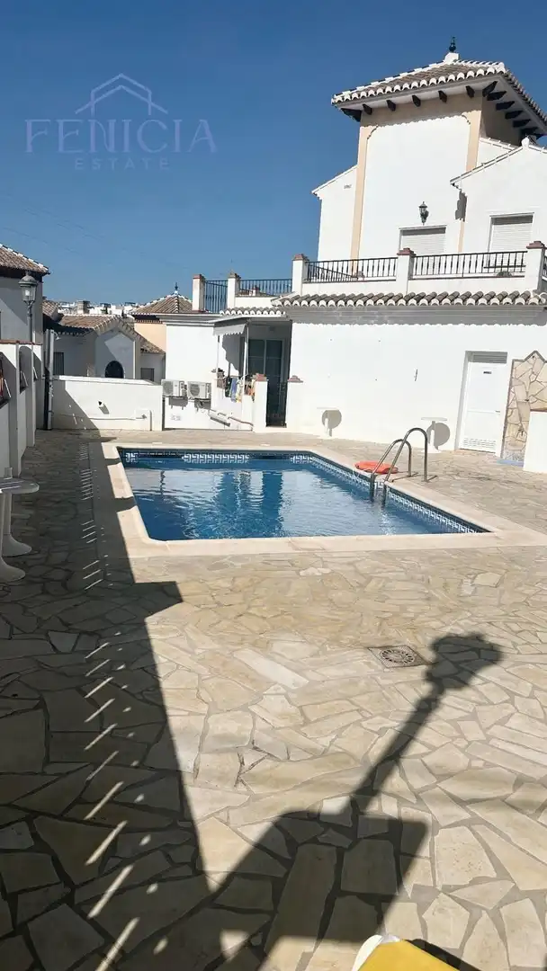 Piscina de Casa adosada en venta en Nerja con Jardín privado, Terraza y Piscina comunitaria