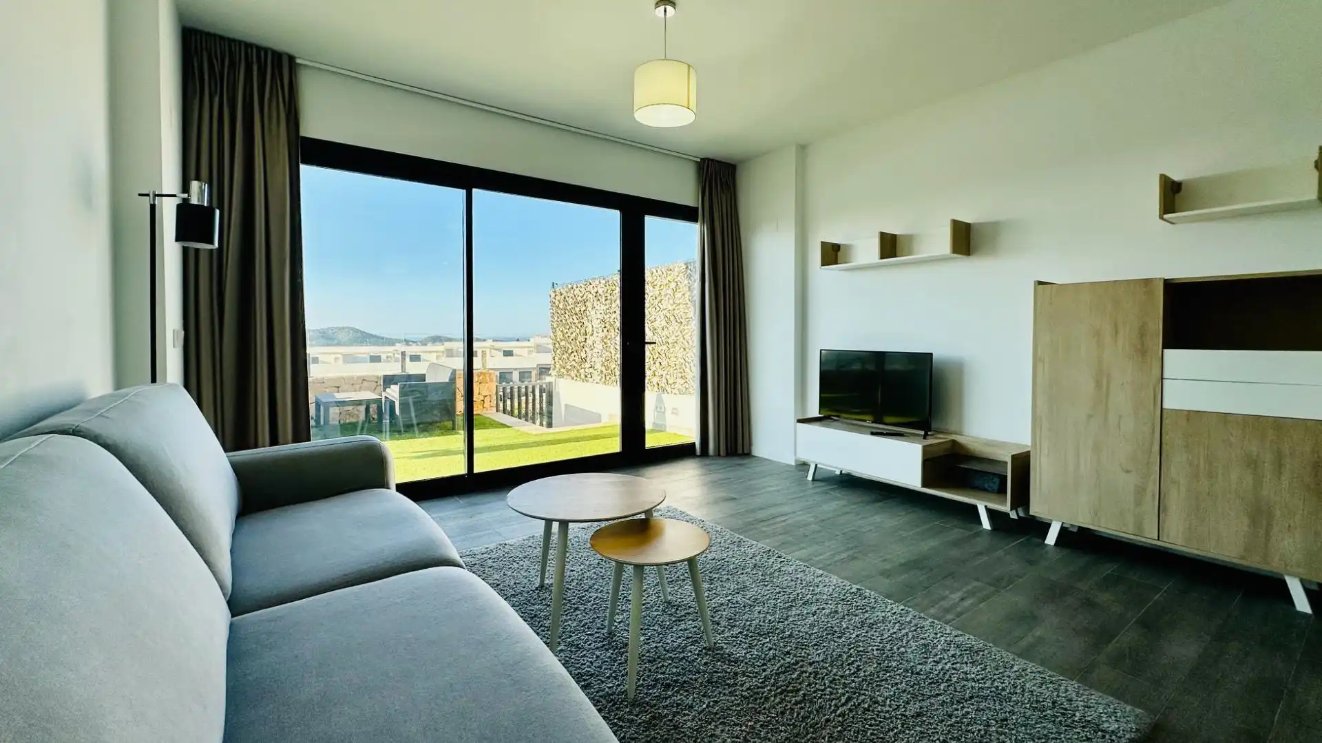 Sala de estar de Apartamento de alquiler en Finestrat con Aire acondicionado, Calefacción y Terraza