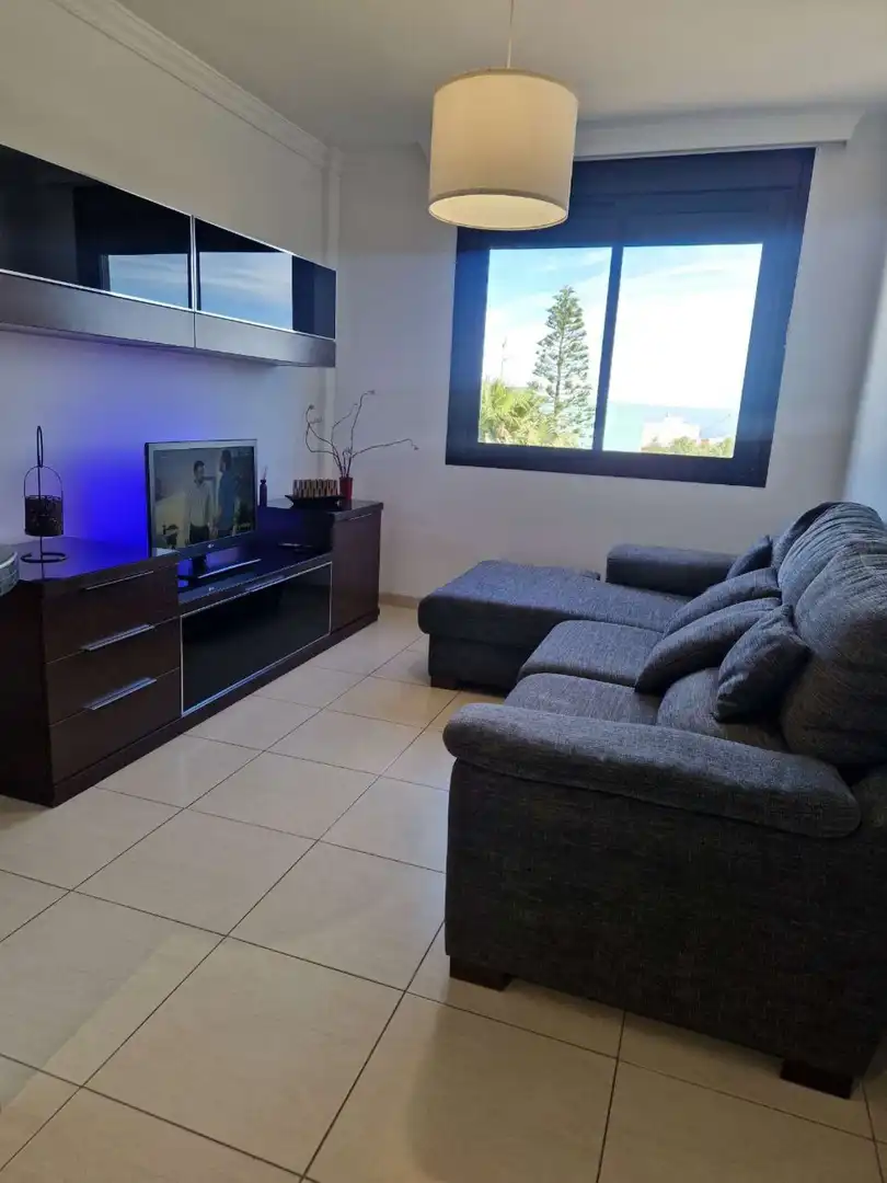 Sala de estar de Apartamento para compartir en San Cristóbal de la Laguna con Aire acondicionado, Terraza y Amueblado
