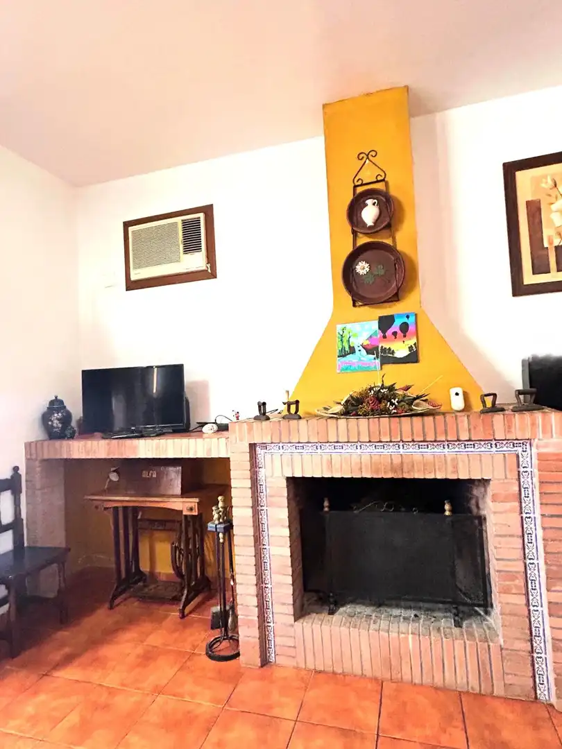 Sala de estar de Finca rústica en venta en Cantillana con Aire acondicionado, Terraza y Piscina