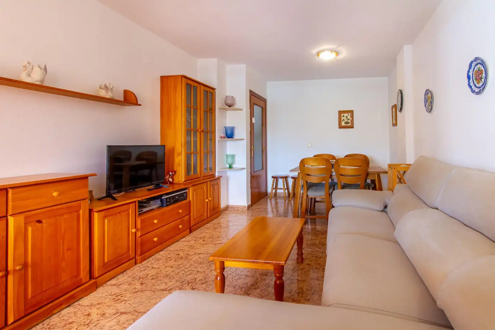 Sala d'estar de Casa adosada en venda en Villajoyosa / La Vila Joiosa amb Aire condicionat, Moblat i Piscina comunitària