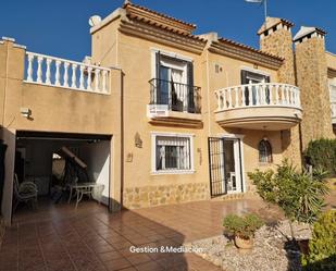 Exterior view of Single-family semi-detached for sale in Torrevieja  with Air Conditioner, Heating and Private garden