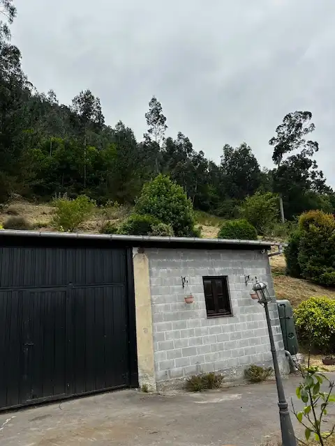 Vista exterior de Casa adosada en venda en Pravia amb Calefacció, Jardí privat i Terrassa