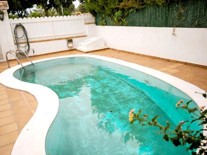 Piscina de Casa adosada en venda en Torredembarra amb Jardí privat, Terrassa i Piscina