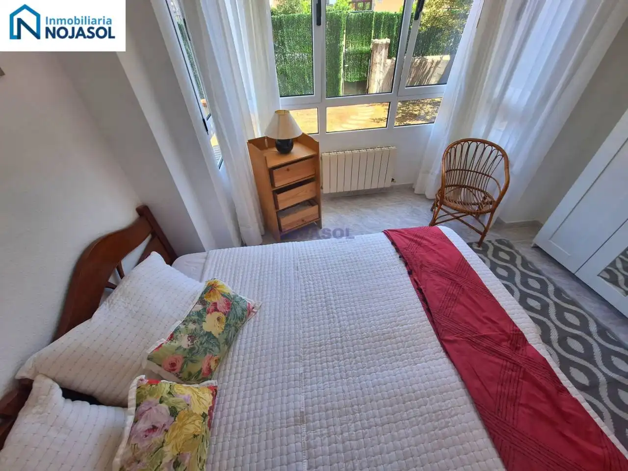 Dormitori de Apartament de lloguer en Noja amb Calefacció, Jardí privat i Terrassa