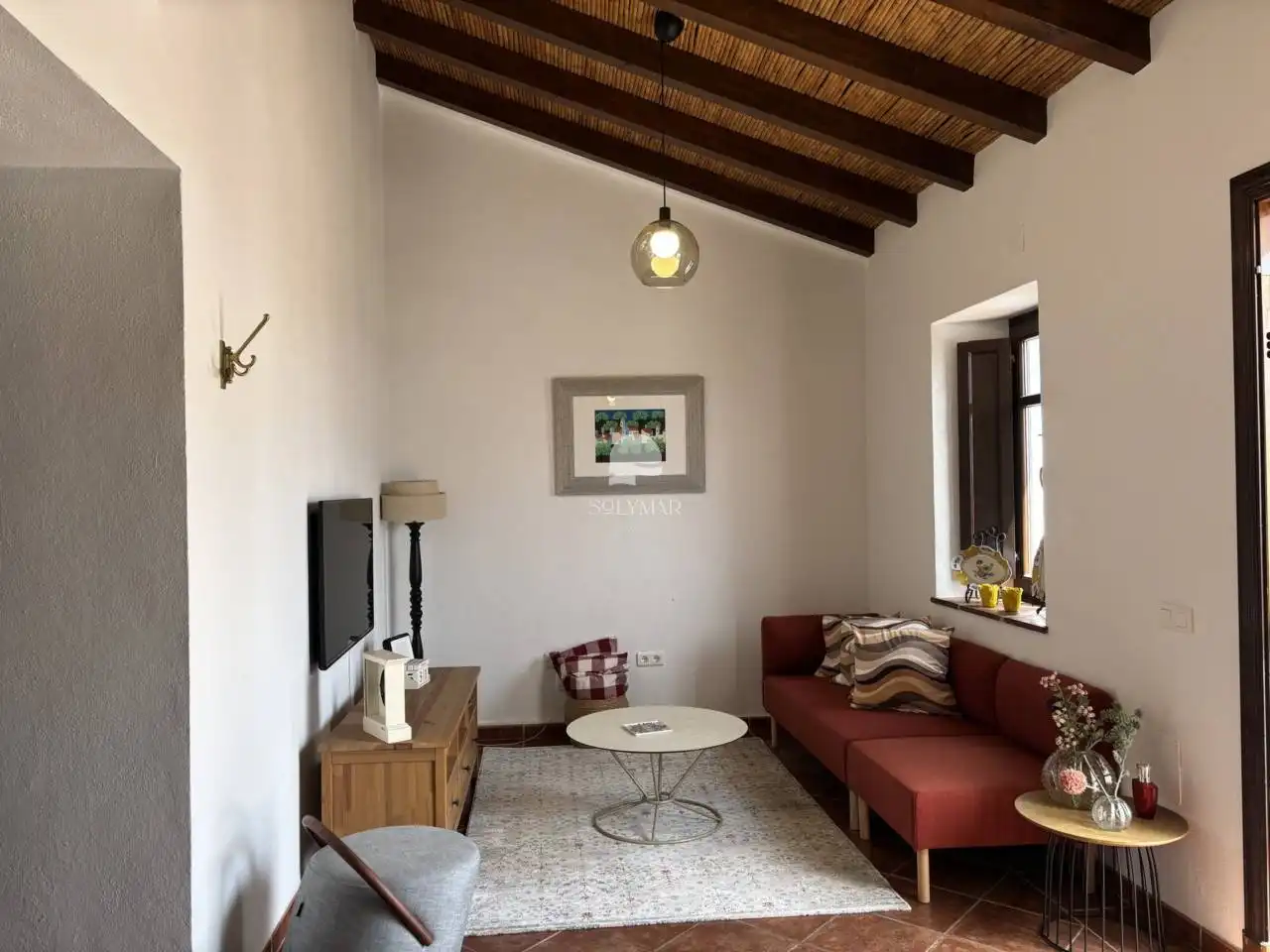 Sala d'estar de Finca rústica de lloguer en Vélez-Málaga amb Aire condicionat, Terrassa i Moblat