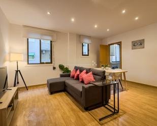 Sala d'estar de Apartament de lloguer en  Barcelona Capital amb Aire condicionat, Parquet i Moblat