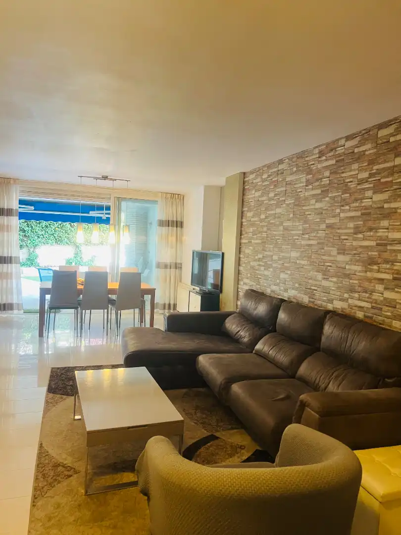 Sala de estar de Piso en venta en Salou con Aire acondicionado, Calefacción y Jardín privado