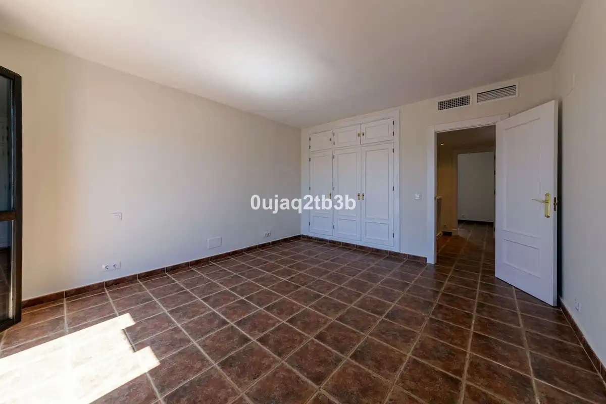 Habitación de Casa adosada de alquiler en Estepona con Aire acondicionado, Jardín privado y Terraza