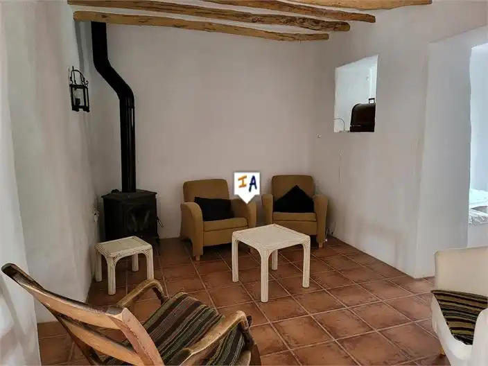 Sala d'estar de Casa adosada en venda en Lora de Estepa amb Piscina
