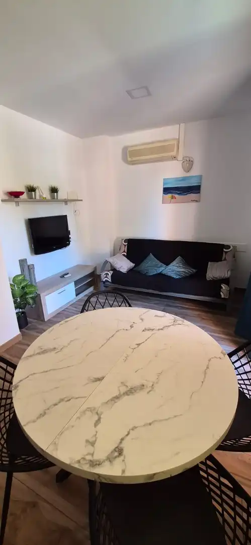 Wohnzimmer von Wohnungen zur Miete in Punta Umbría mit Klimaanlage, Heizung und Möbliert