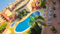 Swimming pool of Apartment to rent in Punta Umbría  with Air Conditioner, Heating and Private garden