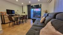 Living room of Single-family semi-detached for sale in Mont-roig del Camp  with Air Conditioner, Private garden and Community pool