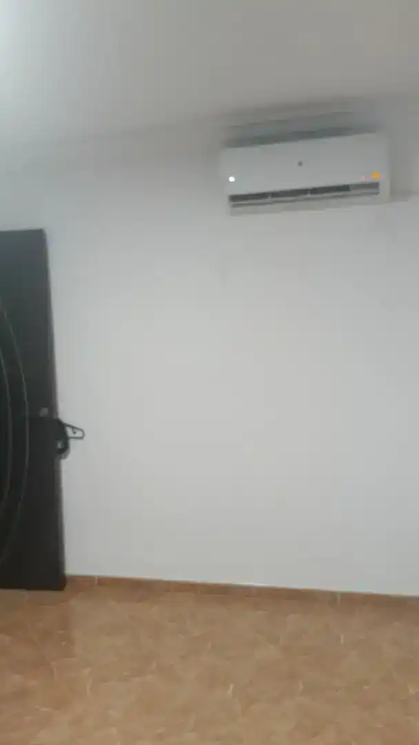 Sala d'estar de Casa adosada en venda en Málaga Capital amb Aire condicionat