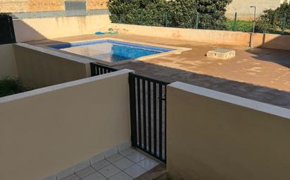 Piscina de Casa adosada en venda en Llubí amb Terrassa i Piscina comunitària