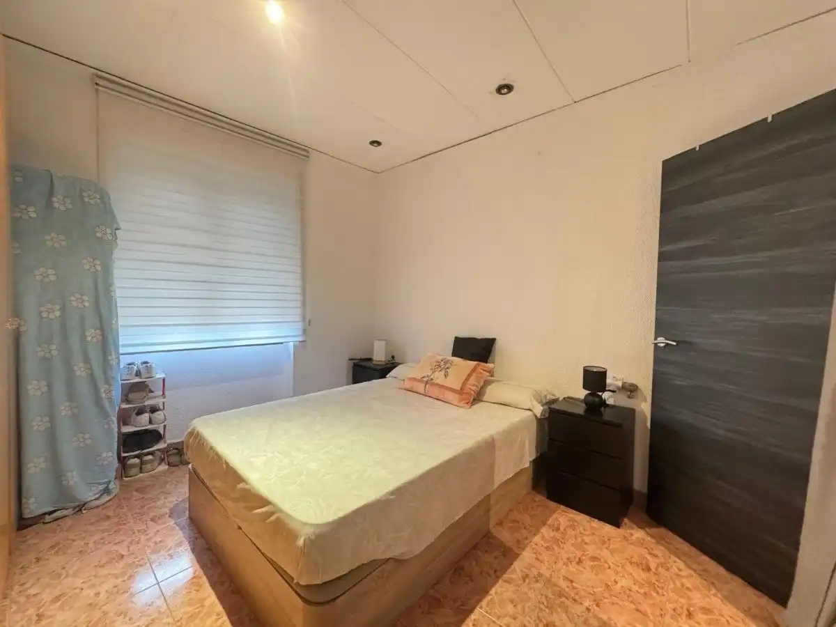 Bedroom of Flat for sale in Tavernes de la Valldigna  with Air Conditioner and Storage room