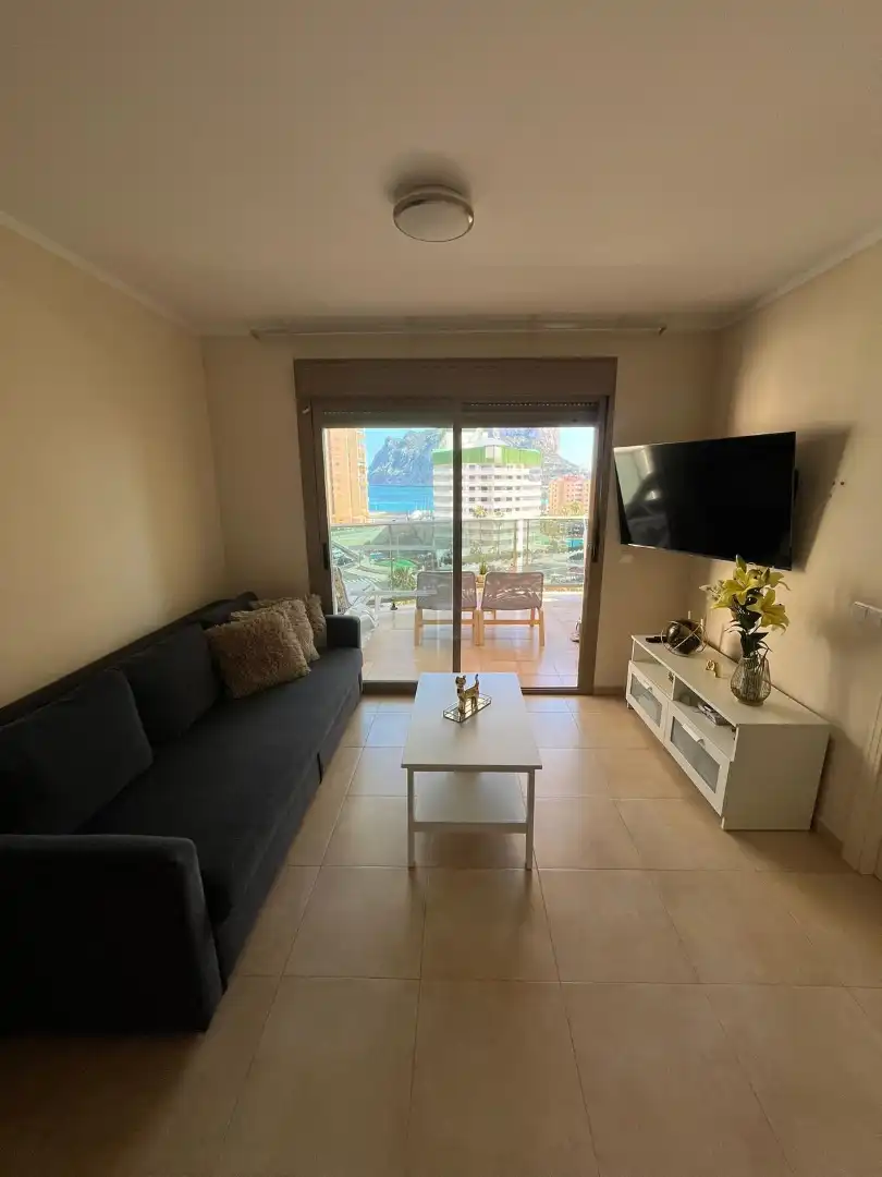 Sala d'estar de Apartament en venda en Calpe / Calp amb Aire condicionat, Calefacció i Terrassa