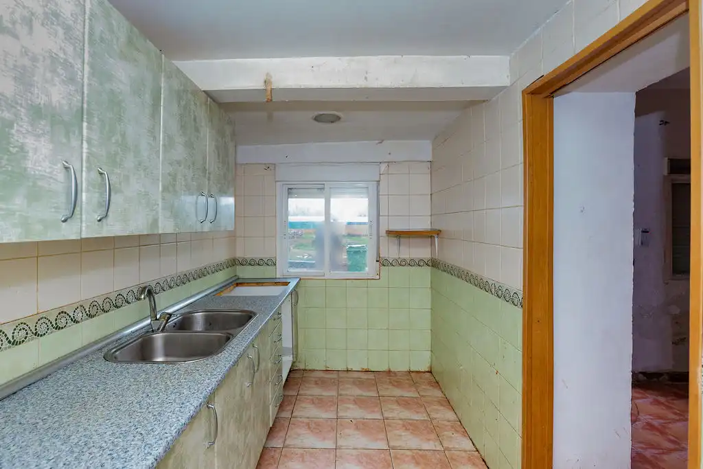 Cuina de Casa adosada en venda en Alcoba amb Aire condicionat