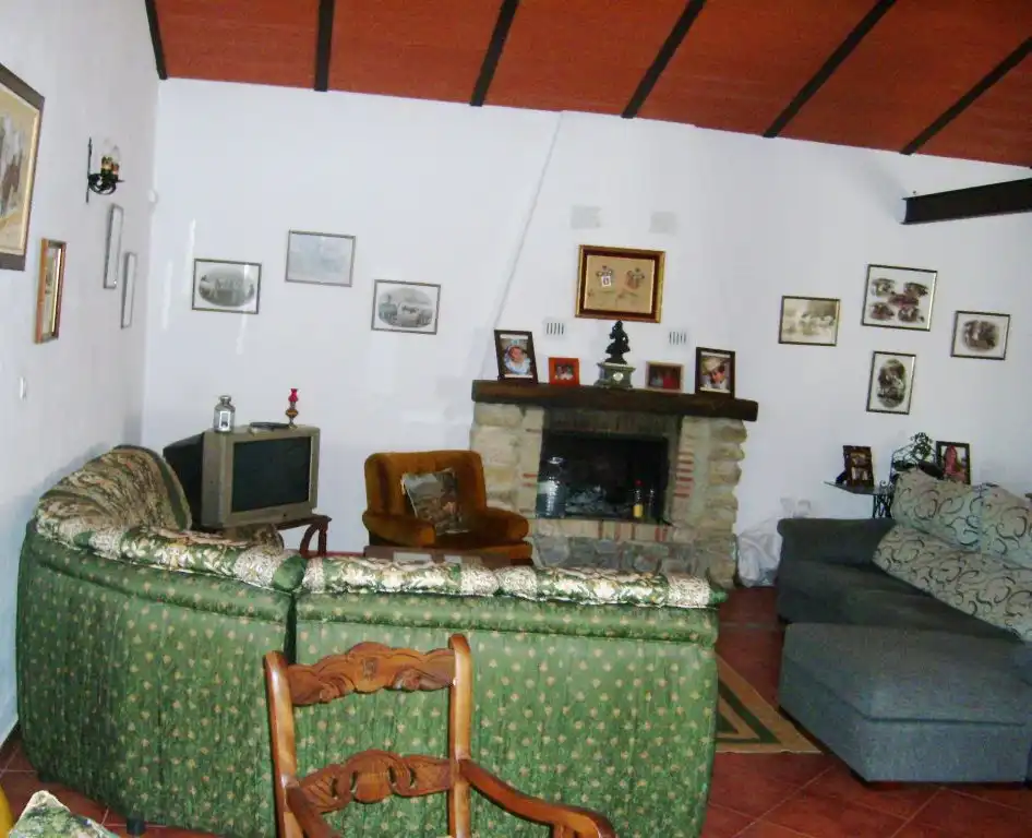Sala de estar de Finca rústica en venta en Antequera con Jardín privado y Amueblado