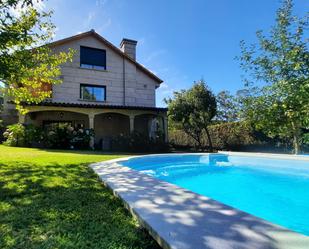 Swimming pool of House or chalet for sale in Nigrán  with Heating, Private garden and Terrace