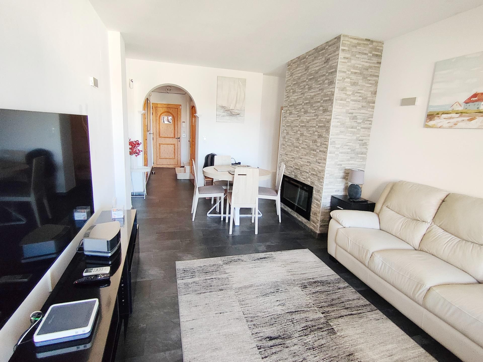 Sala d'estar de Casa adosada en venda en Dénia amb Aire condicionat, Calefacció i Jardí privat