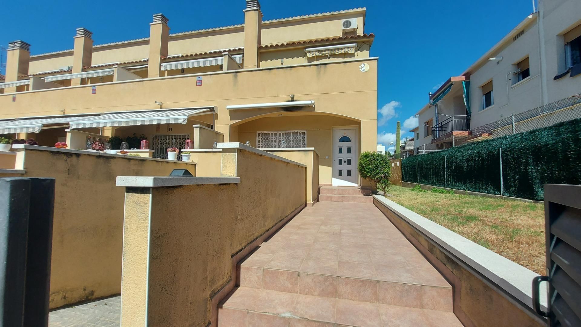 Exterior view of Single-family semi-detached for sale in Calafell  with Air Conditioner, Heating and Private garden