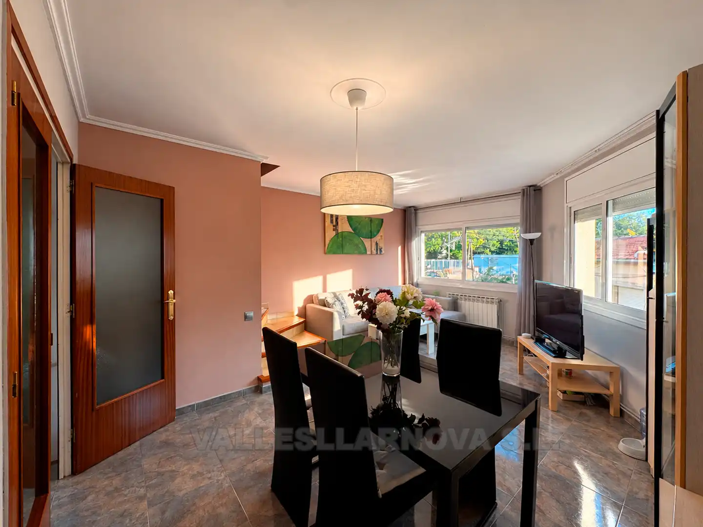 Sala d'estar de Casa adosada en venda en Barri de Lourdes - Gallecs