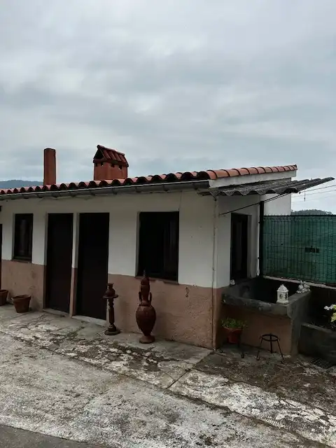 Vista exterior de Casa adosada en venda en Pravia amb Calefacció, Jardí privat i Terrassa