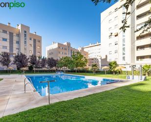 Swimming pool of Flat for sale in  Granada Capital  with Heating, Storage room and Community pool