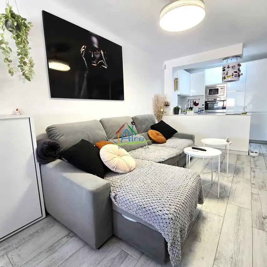 Sala d'estar de Apartament en venda en Almonte amb Aire condicionat i Moblat