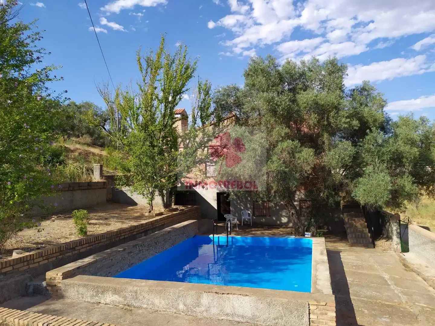 Vista exterior de Casa o xalet en venda en Alanís amb Jardí privat, Terrassa i Traster