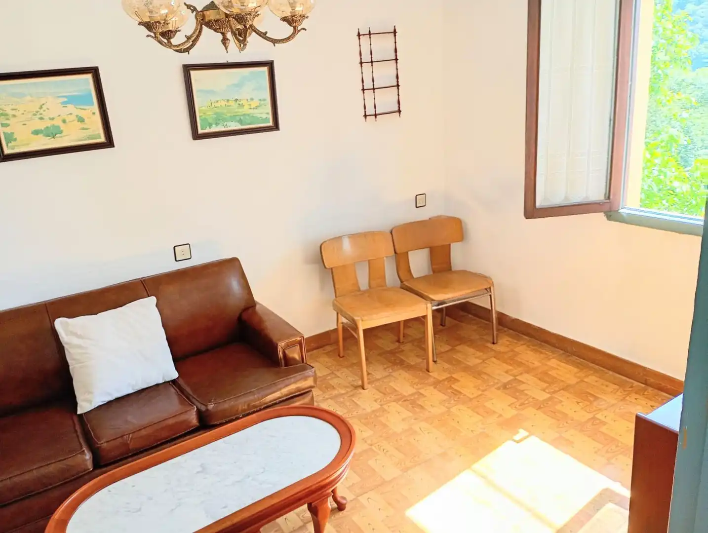 Sala de estar de Casa adosada en venta en Pravia con Calefacción, Terraza y Trastero