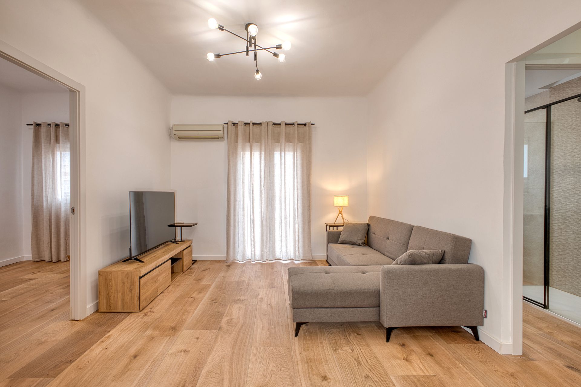Living room of Flat for rent in Jijona / Xixona  with Air Conditioner, Heating and Parquet flooring