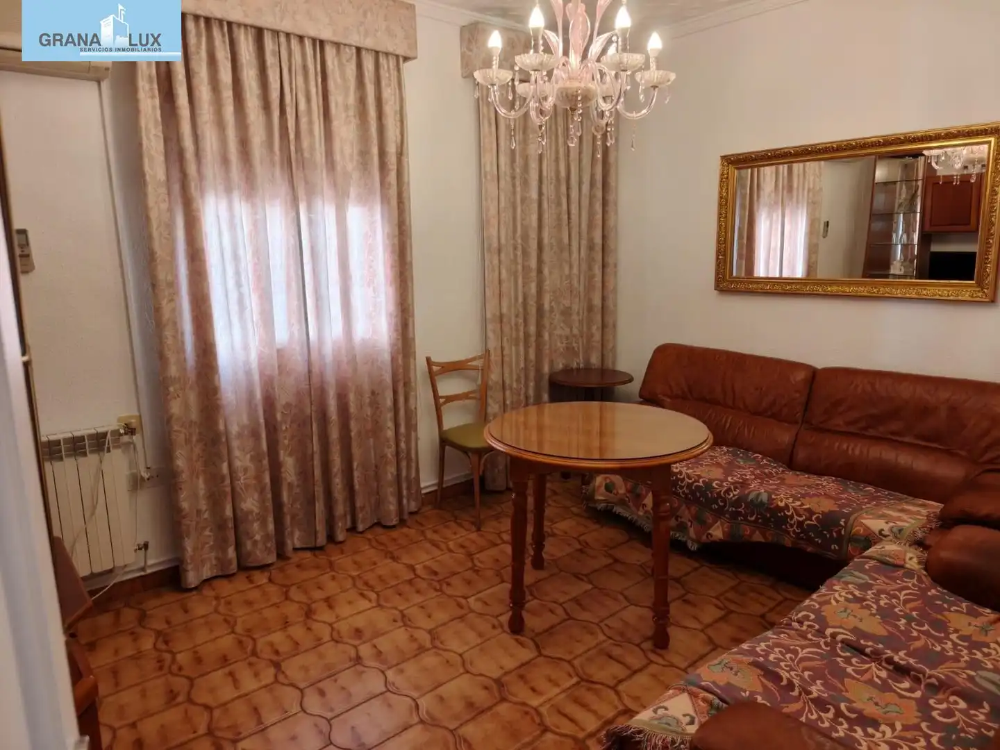 Wohnzimmer von Wohnung zur Miete in Genil