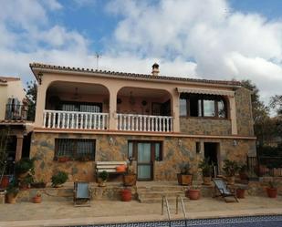 Exterior view of House or chalet for sale in Málaga Capital  with Air Conditioner, Terrace and Swimming Pool