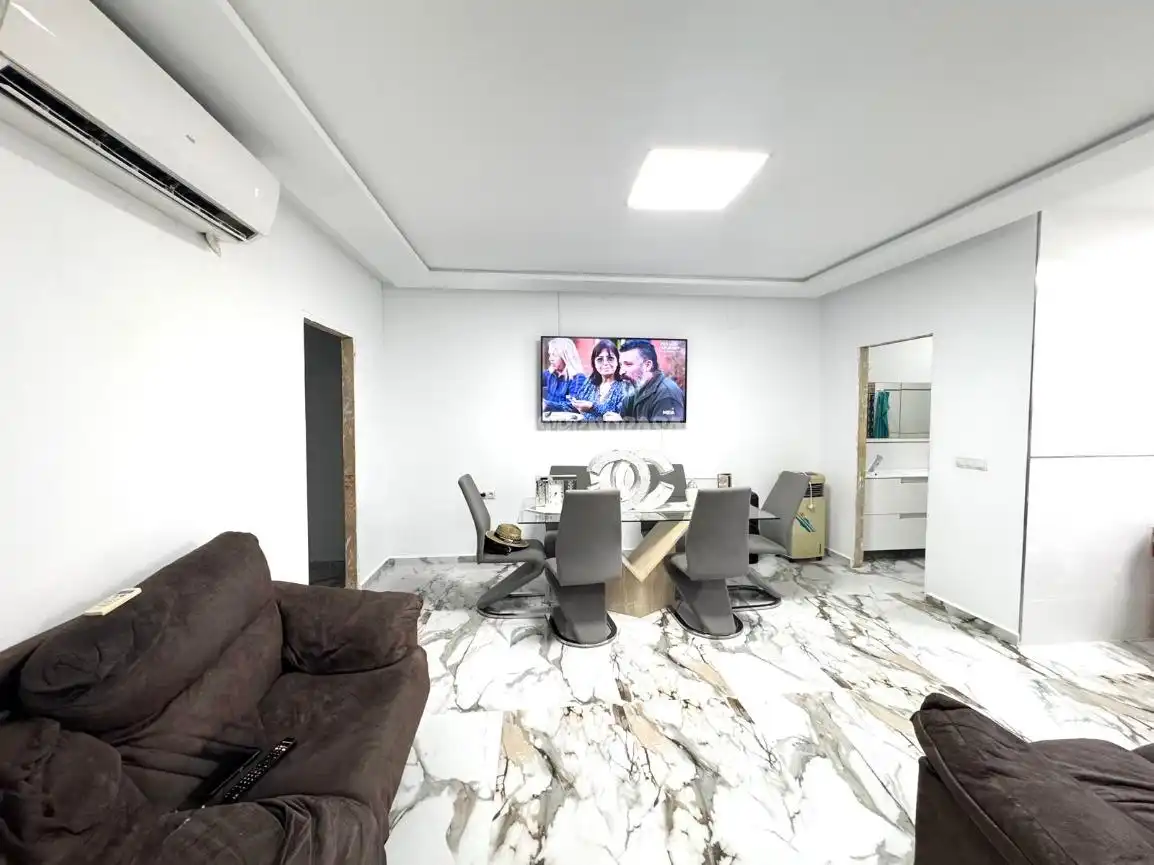 Sala d'estar de Casa adosada en venda en Almería amb Calefacció