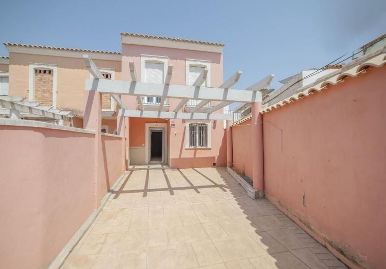 Exterior view of Single-family semi-detached for sale in Huévar del Aljarafe  with Terrace