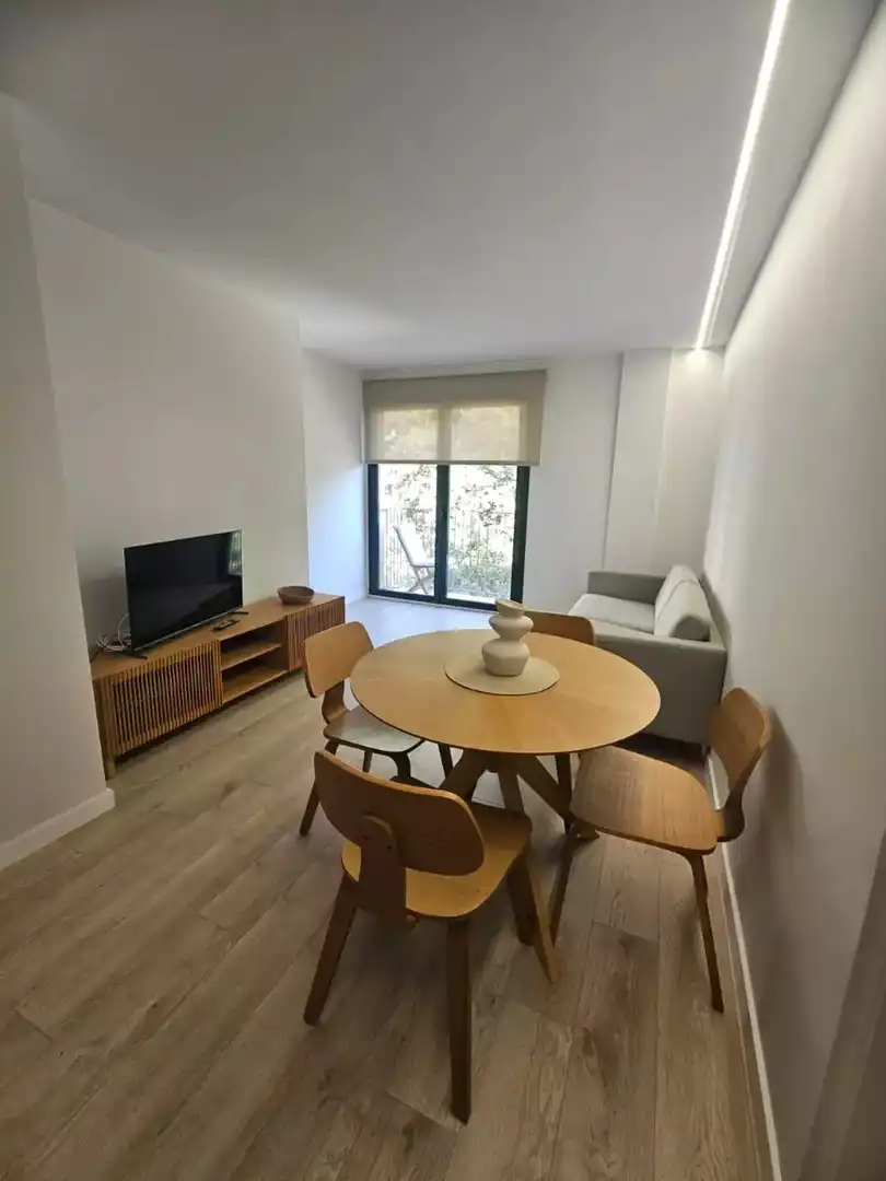 Living room of Flat for rent in Figueres  with Air Conditioner, Heating and Parquet flooring