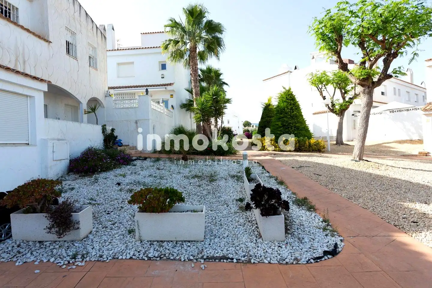 Außenansicht von Einfamilien-Reihenhaus zum Verkauf in La Nucia mit Klimaanlage, Privatgarten und Terrasse