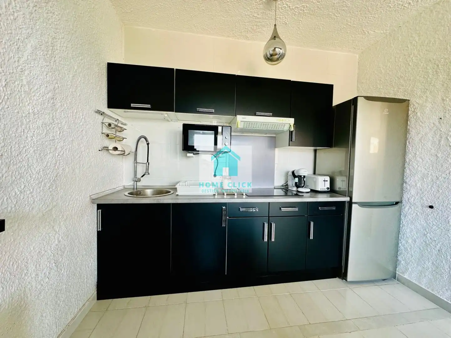 Cuina de Apartament de lloguer en Mont-roig del Camp amb Aire condicionat, Calefacció i Jardí privat