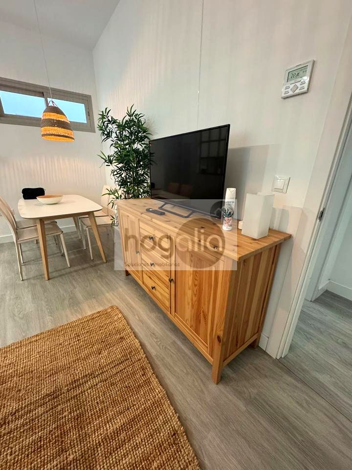 Living room of Planta baja for sale in  Sevilla Capital  with Air Conditioner and Community pool