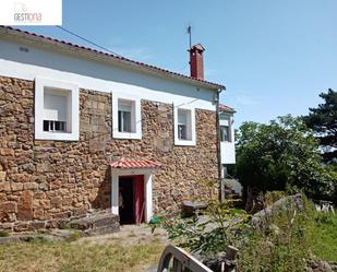 Vista exterior de Casa adosada en venda en Riotuerto amb Calefacció, Jardí privat i Terrassa