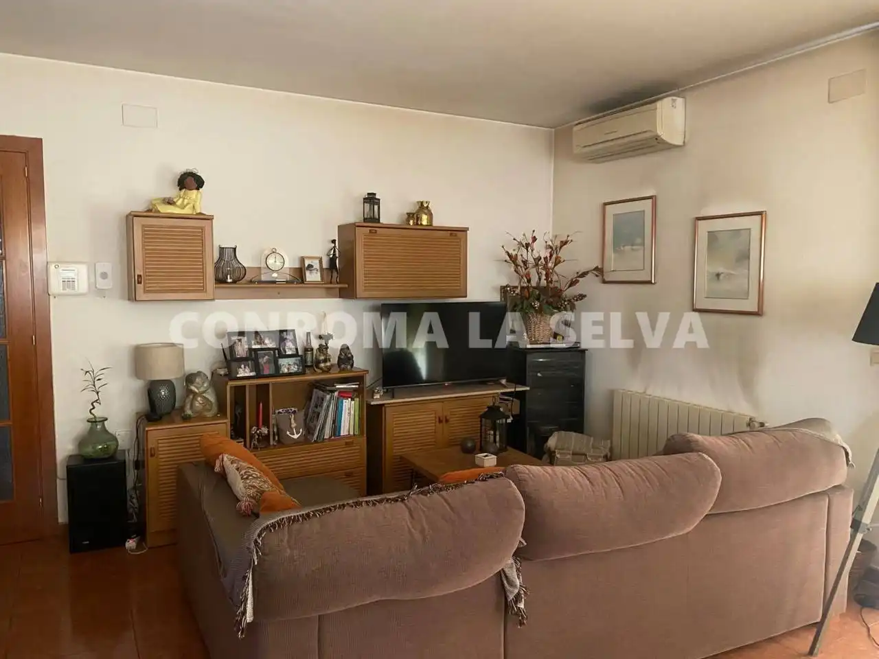 Sala de estar de Piso en venta en Caldes de Malavella con Aire acondicionado, Calefacción y Terraza