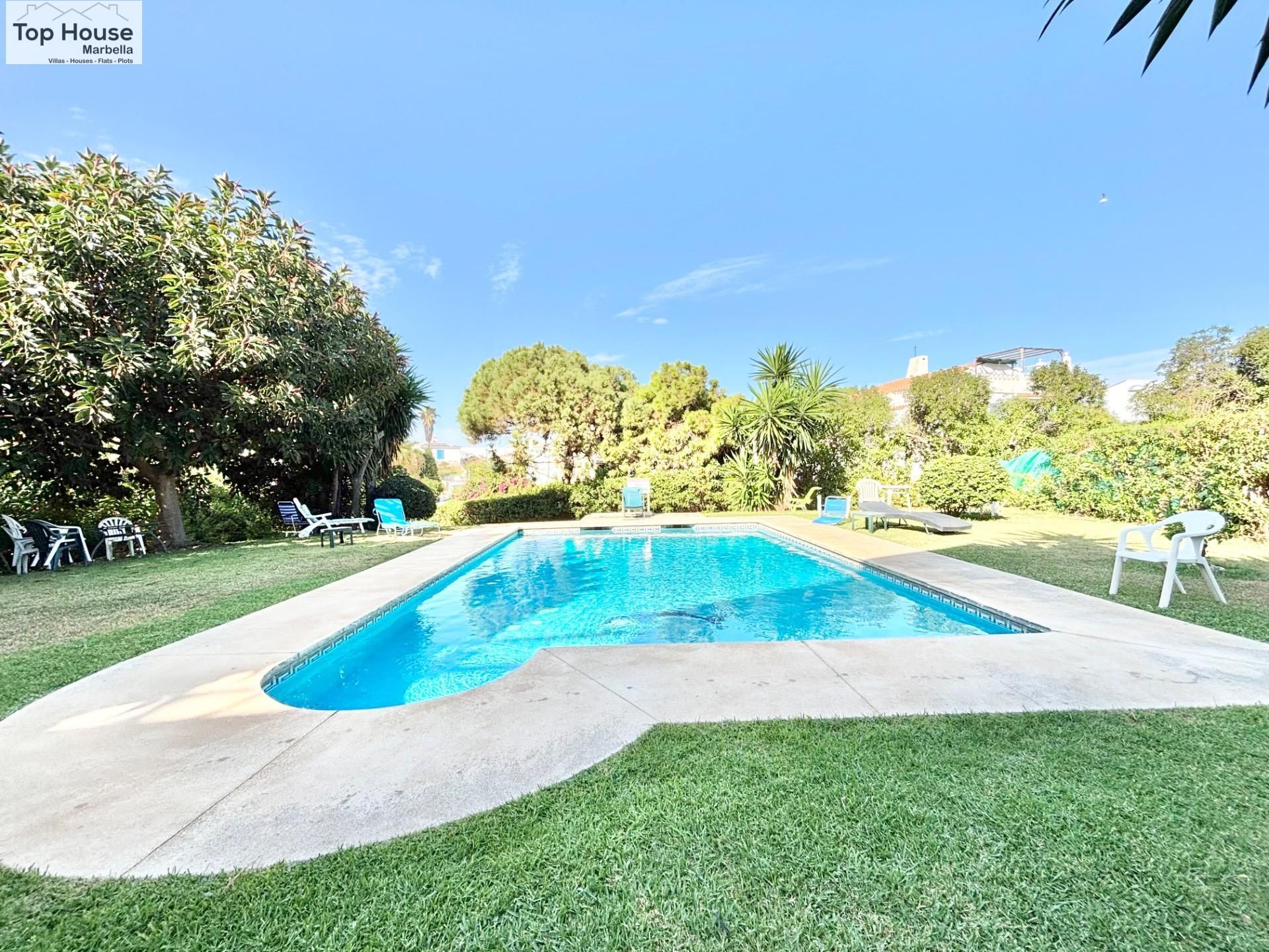 Piscina de Pis de lloguer en Mijas amb Aire condicionat, Jardí privat i Terrassa
