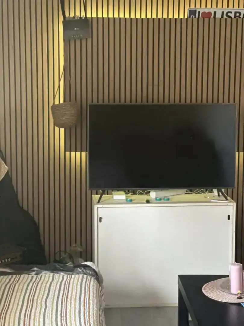 Sala de estar de Casa o chalet para compartir en Barajas de Melo con Aire acondicionado, Jardín privado y Parquet