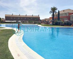 Swimming pool of Single-family semi-detached for sale in Islantilla