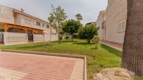 Jardí de Casa adosada en venda en Santa Pola amb Terrassa