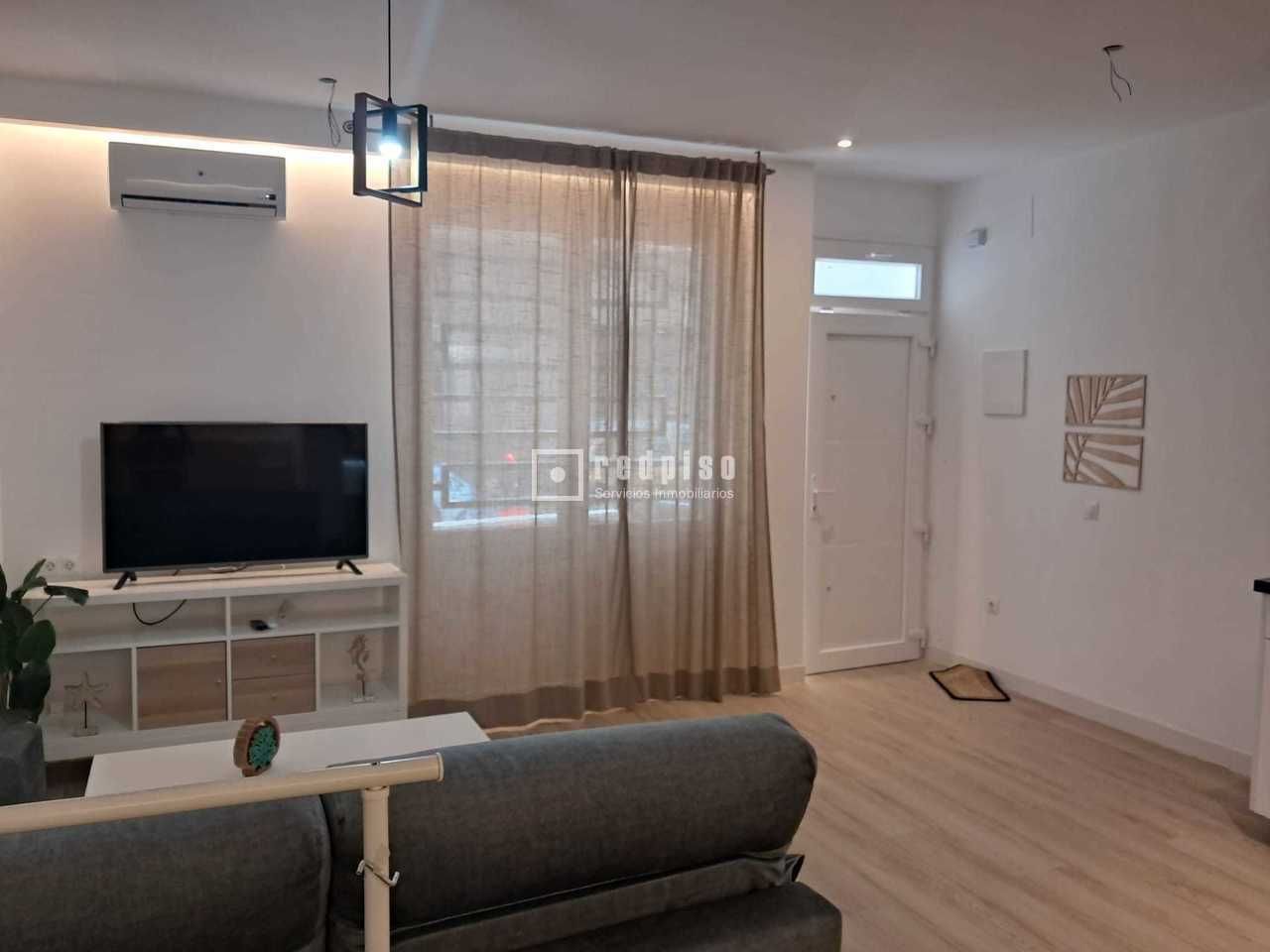 Sala de estar de Estudio de alquiler en Málaga Capital con Aire acondicionado
