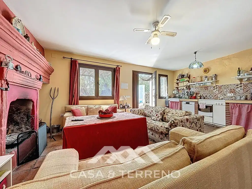 Sala d'estar de Casa o xalet en venda en Comares amb Aire condicionat, Jardí privat i Terrassa